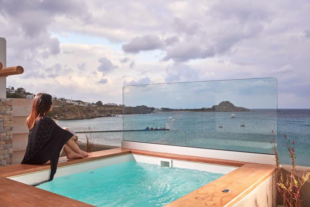 Suite deluxe con bañera de hidromasaje y vistas al mar